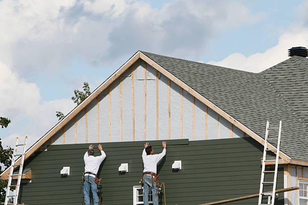 Professional Siding technician working in Danbury, TX